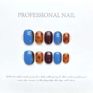 Handmade leopard print amber press-on nails with tortoiseshell design and glossy finish