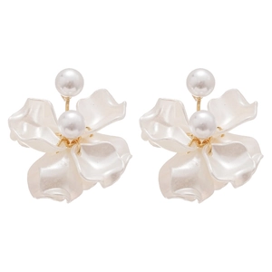 Elegant white floral tassel earrings with pearls and gold accents on a white background