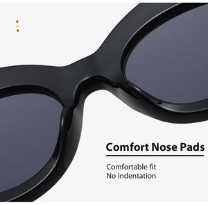 Detail of comfortable ergonomic nose pads on black cat-eye sunglasses with high gloss finish