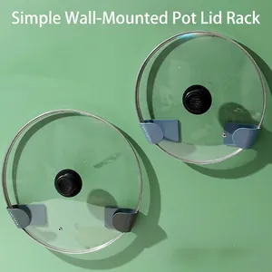 Wall-mounted pot lid holders in blue and grey, adjustable split design for kitchen storage