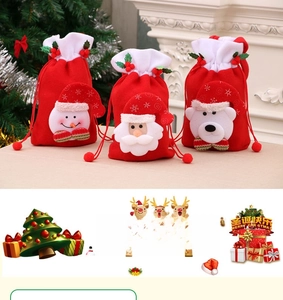 Detailed view of red velvet Christmas drawstring bags with Santa, Snowman and Polar Bear