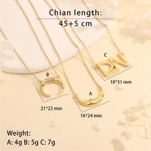 Detailed size specifications for crescent, horn, and letter DN necklaces in gold finish
