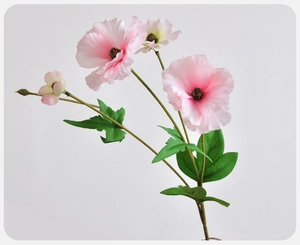 Close-up of pink butterfly ranunculus artificial flower with detailed silk petals and buds