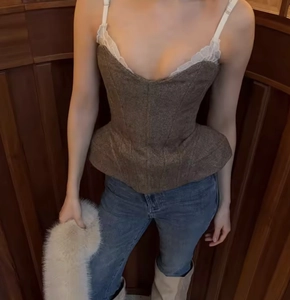 Brown tweed corset vest featuring white lace straps and vintage fishbone boning detail