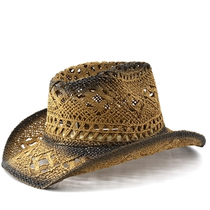 Detail of vintage Western straw hat featuring hollow-out patterns and gradient finish