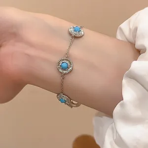 Bracelet vintage géométrique en résine avec pierres turquoise et finition argentée