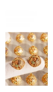 Macro shot of gold floral enamel earrings with micro-inlaid zircon and colorful rose details
