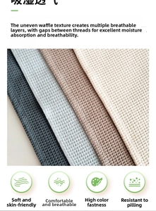 Close-up of honeycomb waffle texture on multi-colored cotton kitchen dishcloths