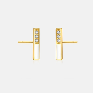 Detail of S925 sterling silver rectangular stud earrings with gold plating and white enamel