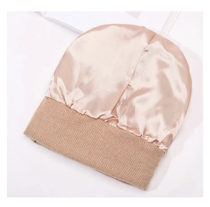 Detail of satin lining and ribbed knit cuff on hair protection beanie for women