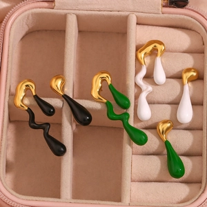 Asymmetrical lava drop earrings in black green and white with 18K gold plated finish