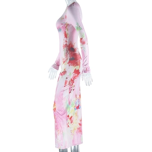 Side view of bodycon long sleeve floral dress in pink with vibrant botanical print