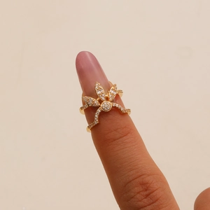 Gold dragonfly finger ring for women featuring micro-pave zircons and floral details