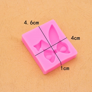 Stampo in silicone rosa con orecchie di coniglio e fiocco per dolci 4,6x4cm