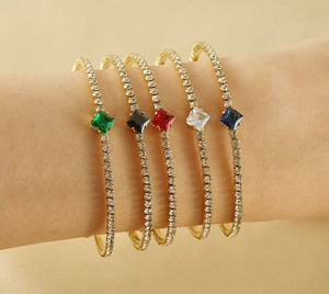 Stacked 18k gold plated stainless steel bangles with colorful zircon gemstones