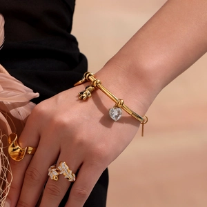 Elegant 18k gold plated bracelet set with heart crystal, bear charm and designer rings