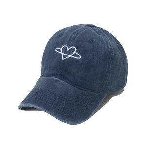 Washed dark blue cotton baseball cap featuring an embroidered heart planet logo