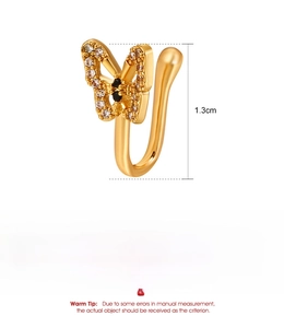 Detail of golden U-shaped fake nose ring with rhinestone butterfly and size specs