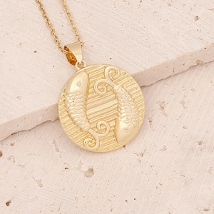 18K gold 12 Zodiac Pisces pendant necklace displayed on a textured stone surface