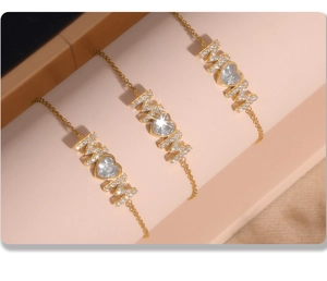 Detailed shot of 18K gold plated MOM bracelet with heart-shaped cubic zirconia