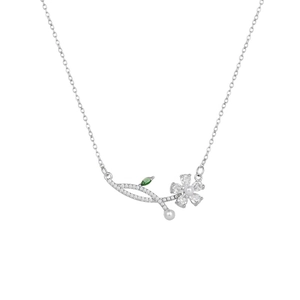 Silver tulip necklace with green gemstone, pearls, and zircons on a delicate chain