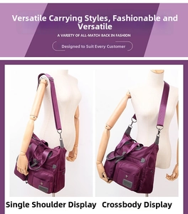 Detail view of purple nylon crossbody travel bag with multiple zipper pockets
