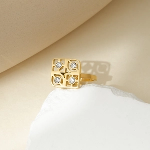 French luxury gold titanium ring with hollow square design and inlaid zircons