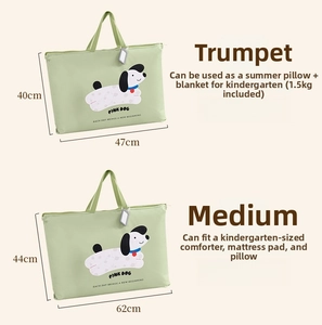 Detailed view of small and medium waterproof quilt storage bags with pink dog prints