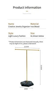 Detail of T-shaped jewelry stand showing 18.5cm bar and 25.5cm height dimensions