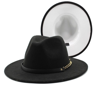 Detail view of wide-brim Fedora with gold chain and interior cotton-polyester label