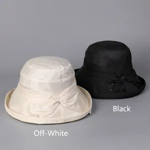 Lightweight Lyocell linen sun hat for women with elegant bow and pearl details