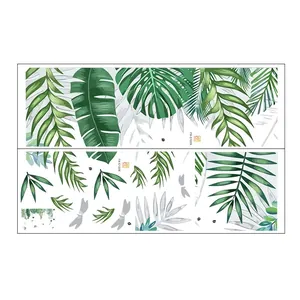 Detail of tropical monstera and palm leaf wall stickers with dragonflies and layout guide