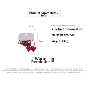 Detail view of red heart earring set with iron and ABS material specs and dimensions