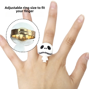 Detail showing the adjustable metal band of the Jack Skellington ghost ring for adults