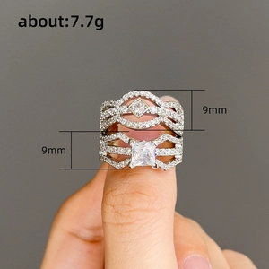 Three-piece bridal ring set with sparkling zircons in a 9mm wide stacked arrangement