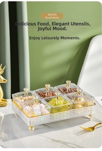Detail of luxury 6-compartment snack organizer with crystal lids and gold base feet