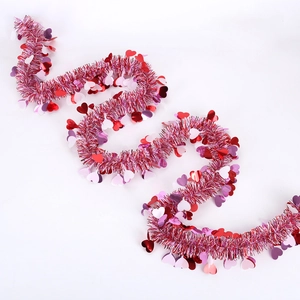 Pink tinsel garland with red and white heart sequins for Valentine's party decoration