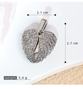 Detailed view of silver heart wing pendant with dimensions and pavé cubic zirconia