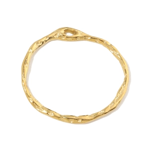Detailed view of golden irregular ring pendant with organic hammered texture finish
