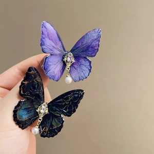 Elegant butterfly hair clips with purple silk wings, rhinestones and hanging white pearls