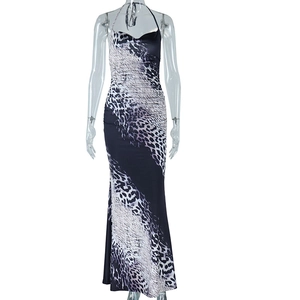 Detail of the bodycon animal print dress featuring side ruching and draped neckline