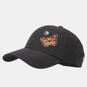 Detail shot of black baseball cap with vibrant butterfly embroidery and quick-dry fabric