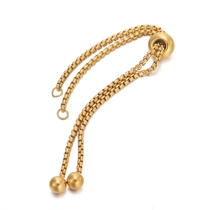 Detail of gold box chain with adjustable slider and bead ends for DIY jewelry