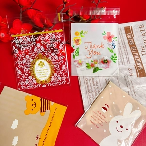 Detailed view of assorted cartoon bear self-adhesive plastic bags for cookies and candies