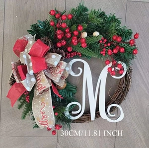 Detailed 30cm Christmas teardrop wreath with pine needles, red berries, and letter M decoration