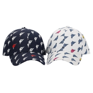 Detail of navy and white baseball caps with all-over colorful pigeon prints