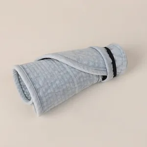 Foldable light blue denim sun hat with roll-up design and elastic band for easy travel