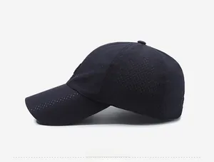 Close-up of the breathable perforated mesh fabric and side logo on this black sports cap