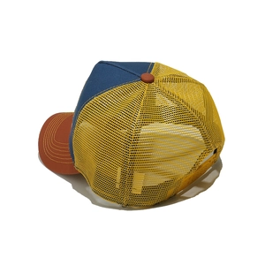 Detailed back view of a tri-color trucker hat with yellow mesh and adjustable snapback