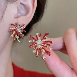 Elegant red enamel firework stud earrings with sparkling zircons and gold plating